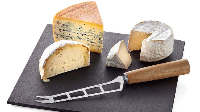 
                    Cheese knife of the cheese knife set on cheese platter