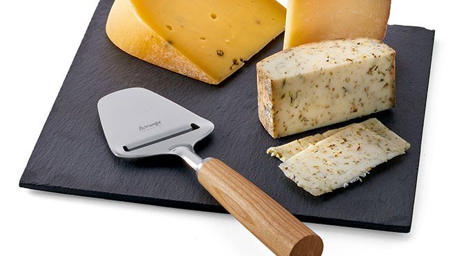 
                    Cheese slicer of the cheese knife set on cheese platter